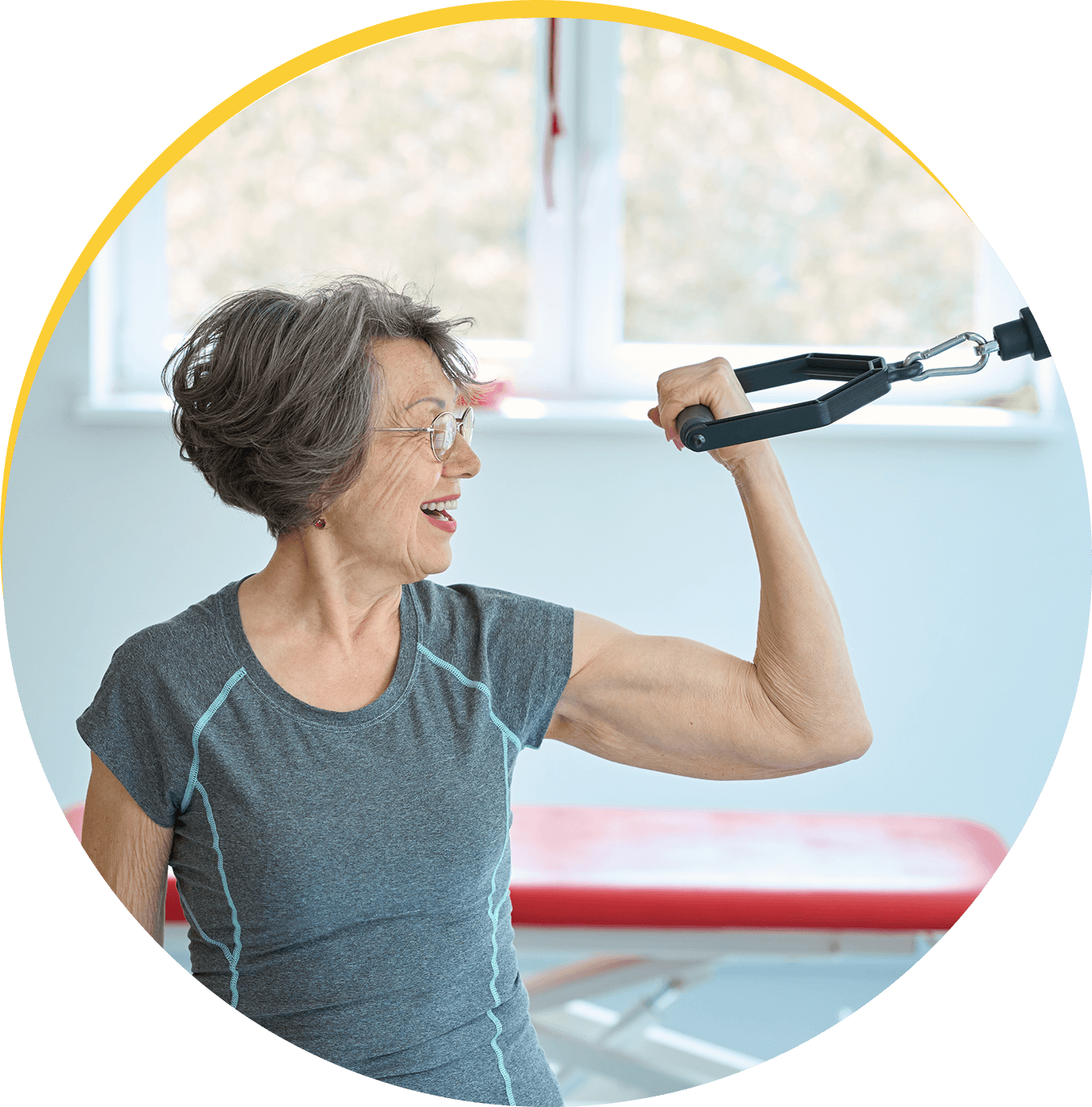 t11 (1) Elderly woman exercising with resistance band.